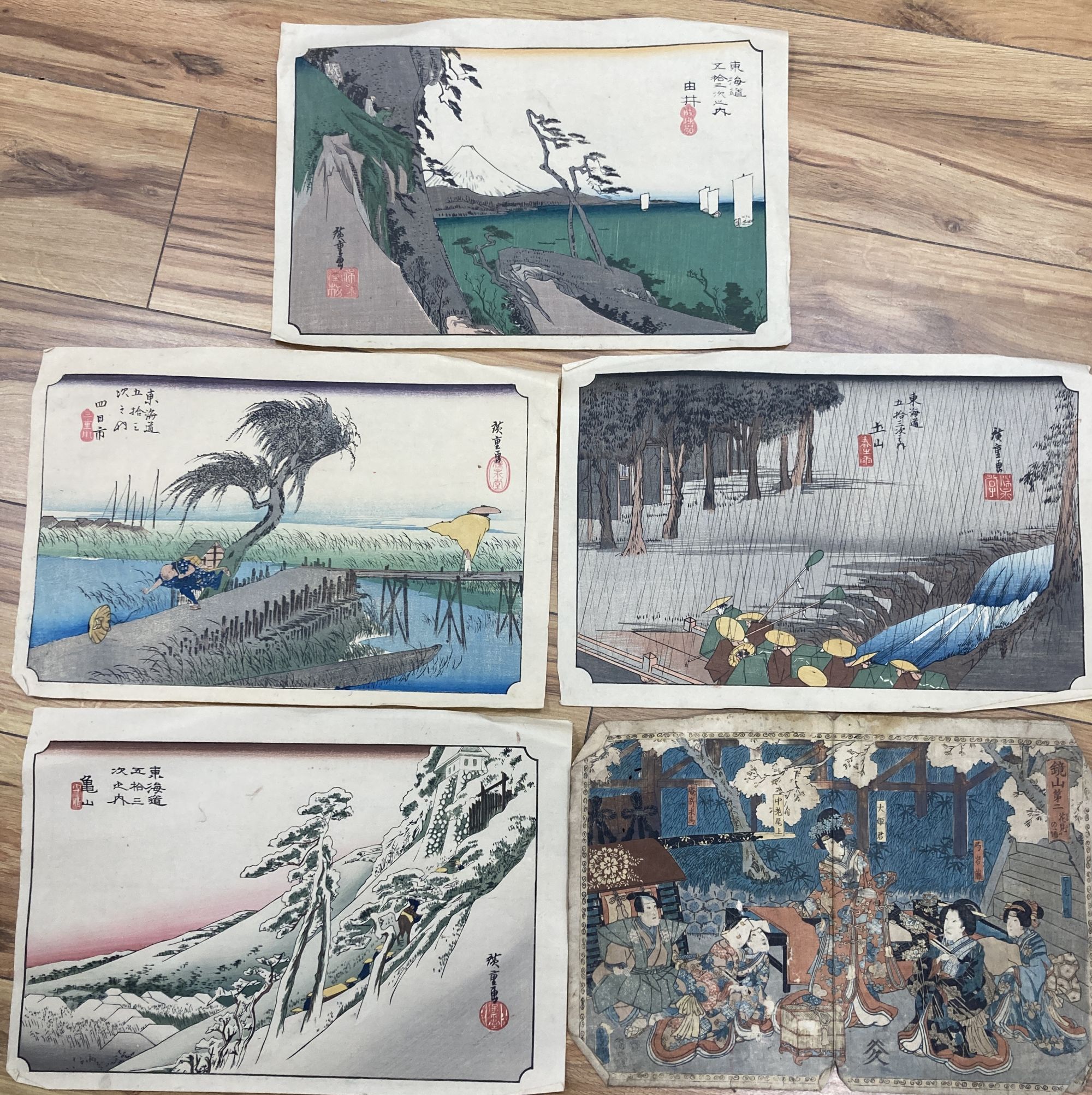 Japanese School , five woodblock prints, Women in a garden and other studies, 24 x 35cm, unframed